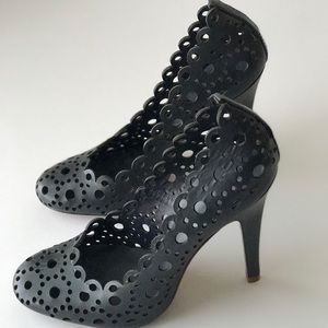 Tory Burch leather Navy Blue perforated heels.