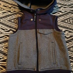 Boys navy hooded Burton vest.