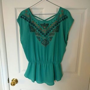 Teal embroidered peplum top Teal embroidered peplum top
