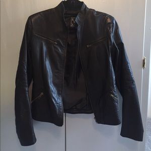 Authentic black leather jacket made in Italy.
