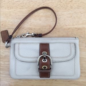 RESERVED Leather Coach front buckle wristlet