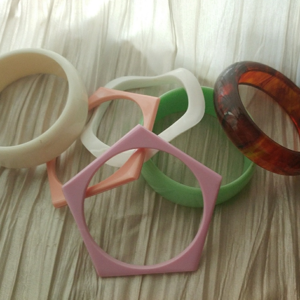 LOt of vintage 80's plastic bracelets.