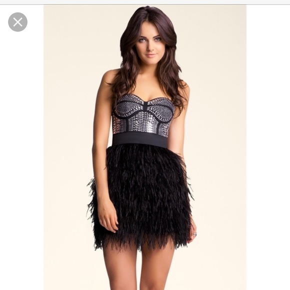 bebe Dresses & Skirts - BEBE Isis Black studded feather dress