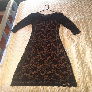 Small black lace Karen Kane dress with nude lining