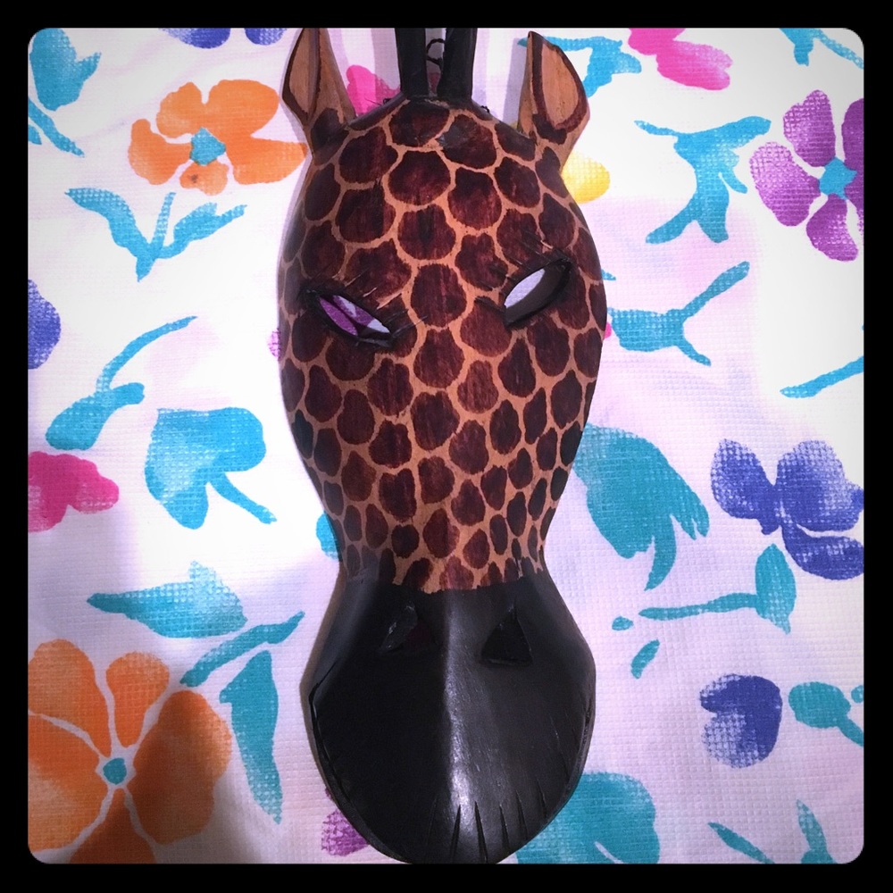 Hand carved wooden giraffe decoration