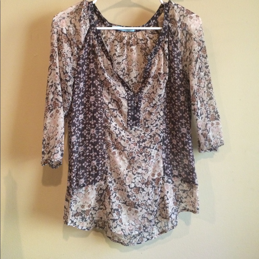 Three quarter length floral shirt