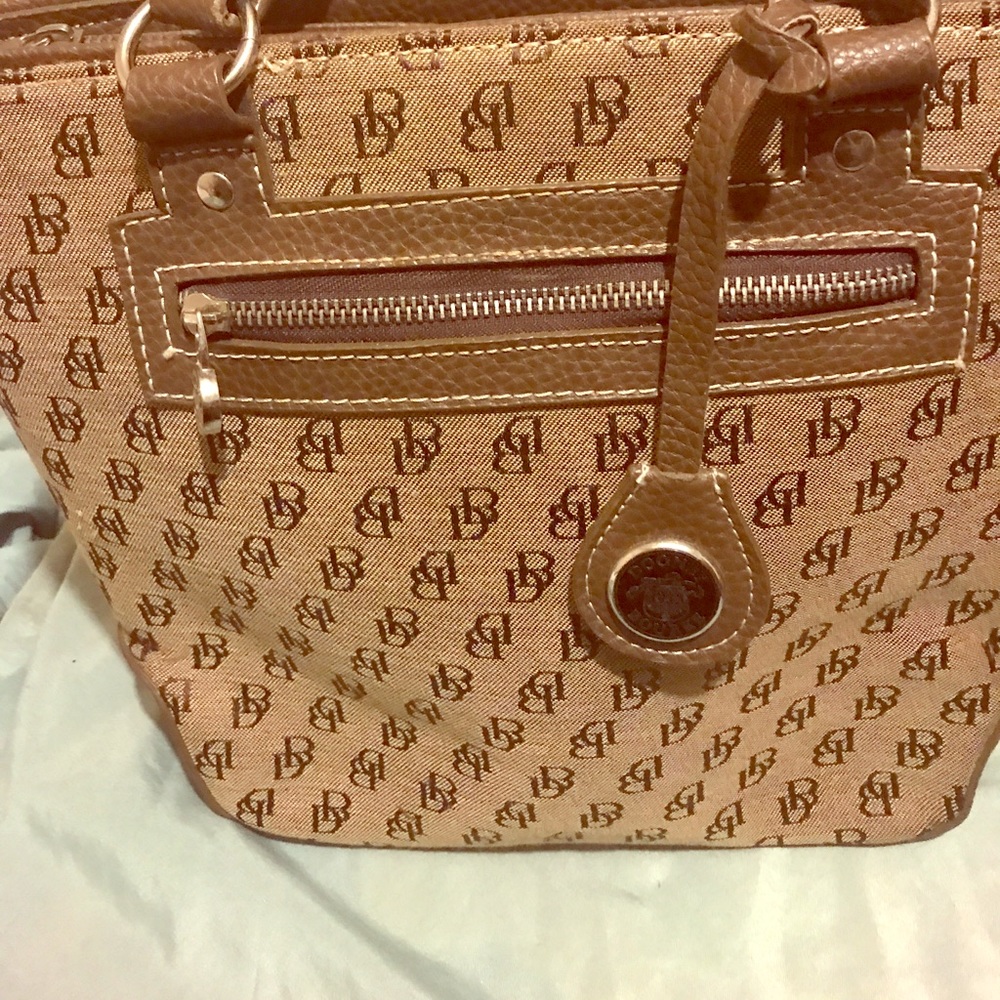 Vintage Dooney and Bourke pocket book