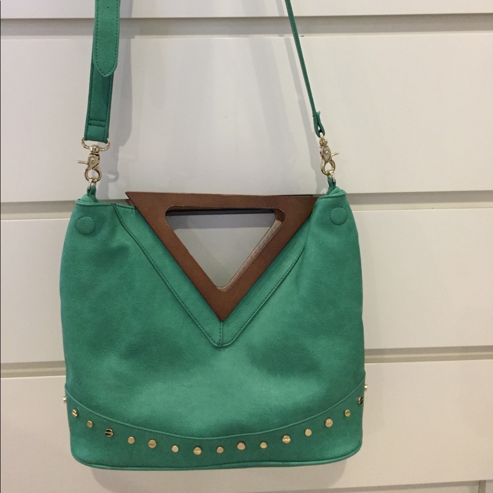 Green studded handbag