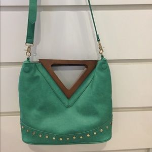 Green studded handbag