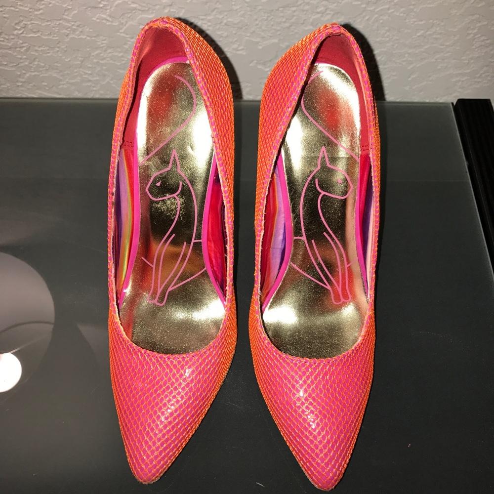 Bright orange pumps
