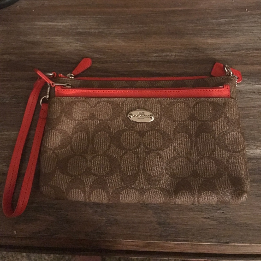 Almost new Coach large wristlet