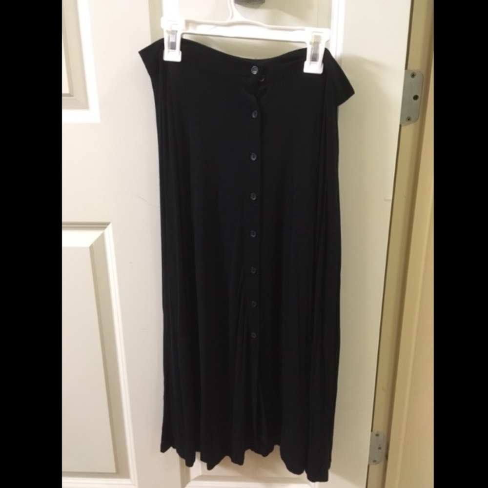 Black midi skirt with buttons and slits