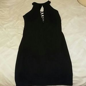Black mini clubbing or homecoming dress.