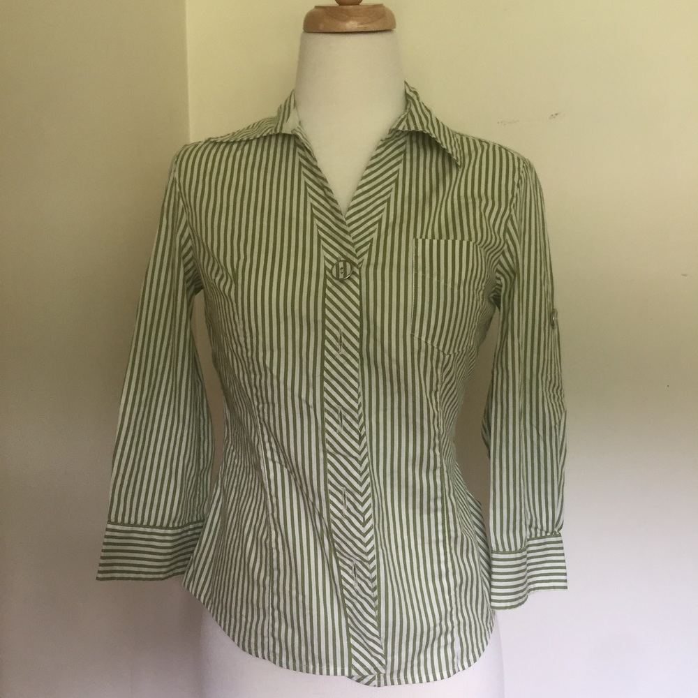 Vertical striped blouse matching striped buttons.