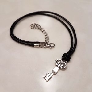 NWOT Key necklace on black cord