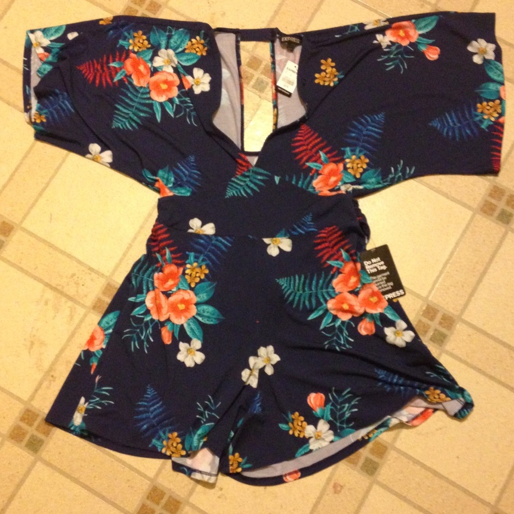 Brand new deep V neck romper