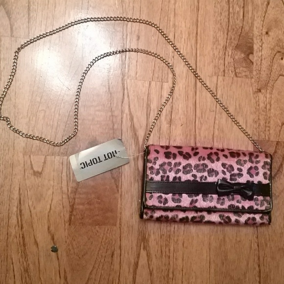 pink leopard print clutch bag