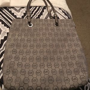 Michael Kors gray tote with metallic straps Michael Kors gray tote with metallic straps