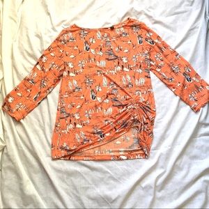 3/4-Sleeve Lite Orange Street Scene Print Knit Top