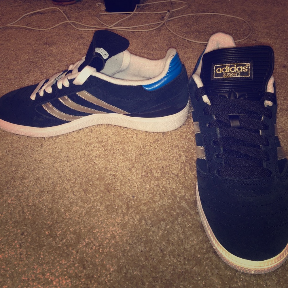 Black and silver adidas busenitz