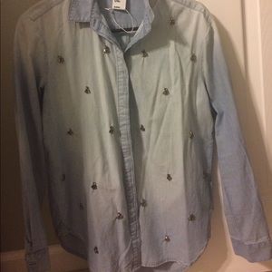 Denim button up with small crystals. Denim button up with small crystals.