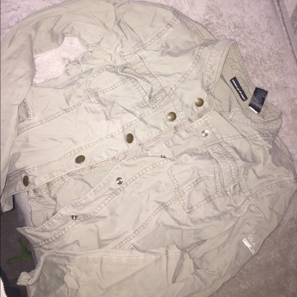 a olive green jacket with 4 pockets