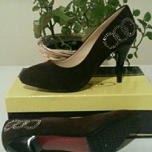 Brown faux sued pumps