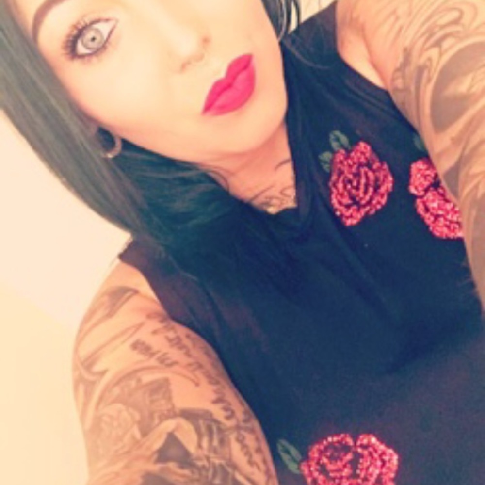 Black shirt with red flowers 🌺