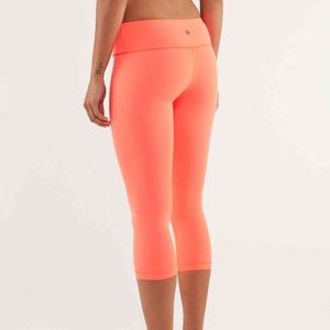 Bright pink Lululemon crop pants