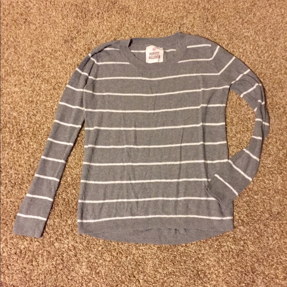 Grey long sleeve with white stripes.