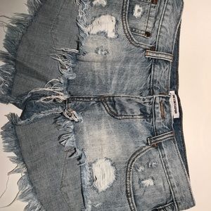 Destroyed denim shorts