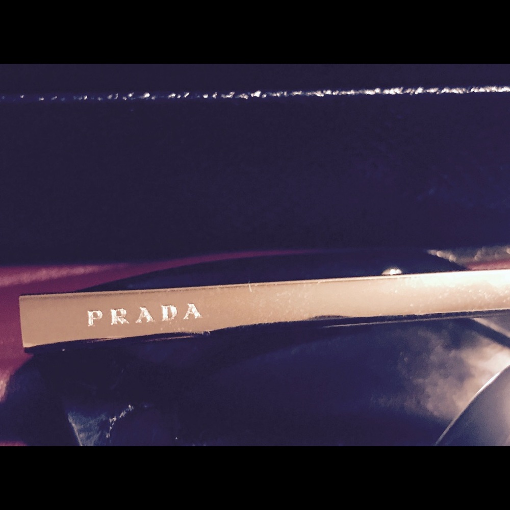 Brand new Prada sunglasses.