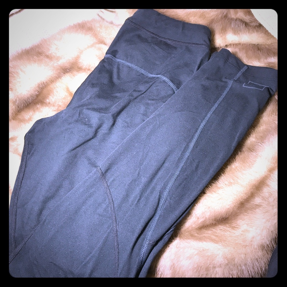 Blue/black r.e.i leggings or long underwear.