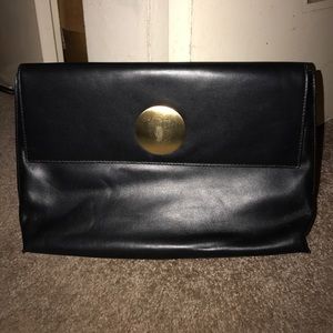 Flynn black leather gold large envelope clutch Flynn black leather gold large envelope clutch