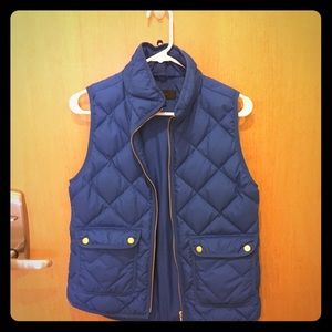 Bright blue puffy vest