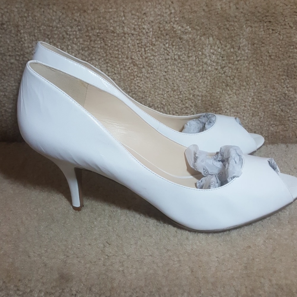 Nine west leather peep toe pumps in white