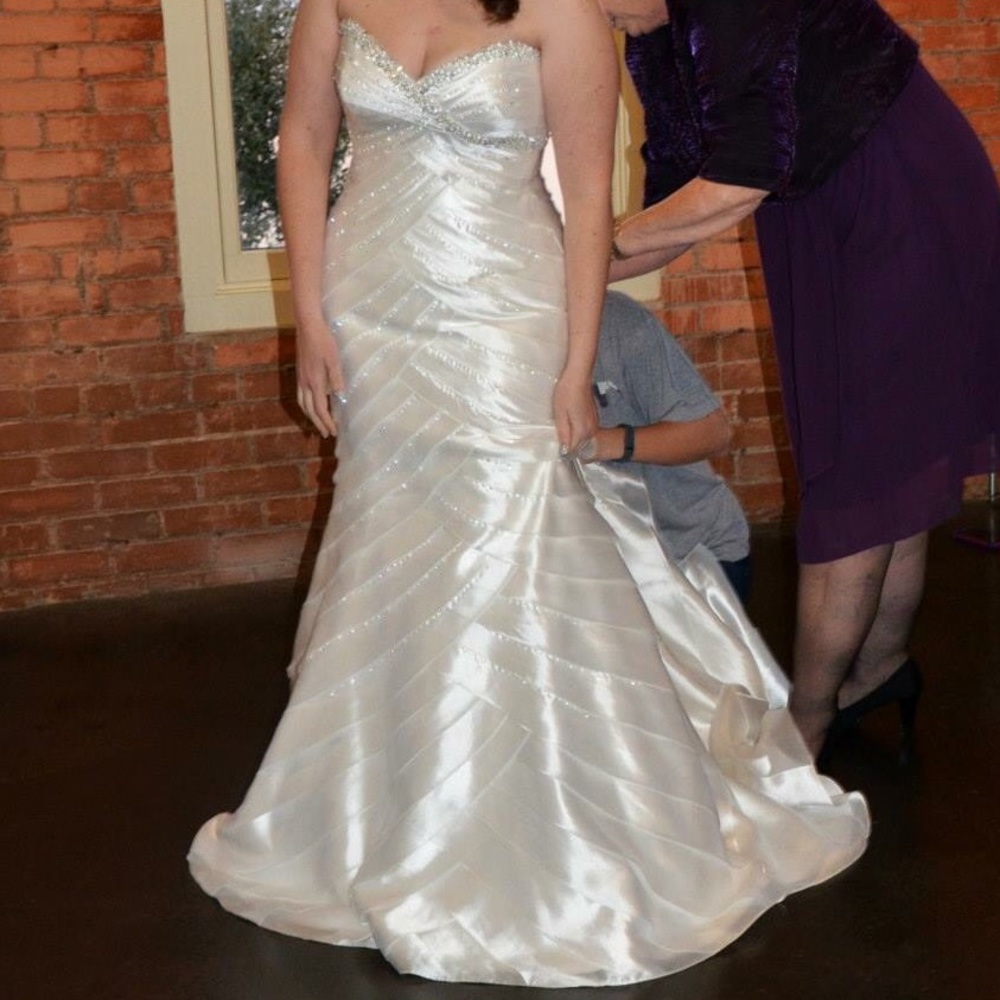 Beautiful White & beaded strapless wedding gown
