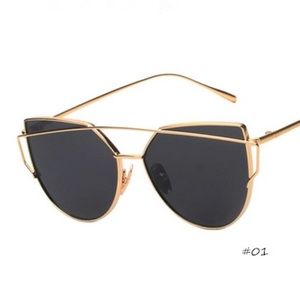 Gold & black metal frame sunglasses Gold & black metal frame sunglasses
