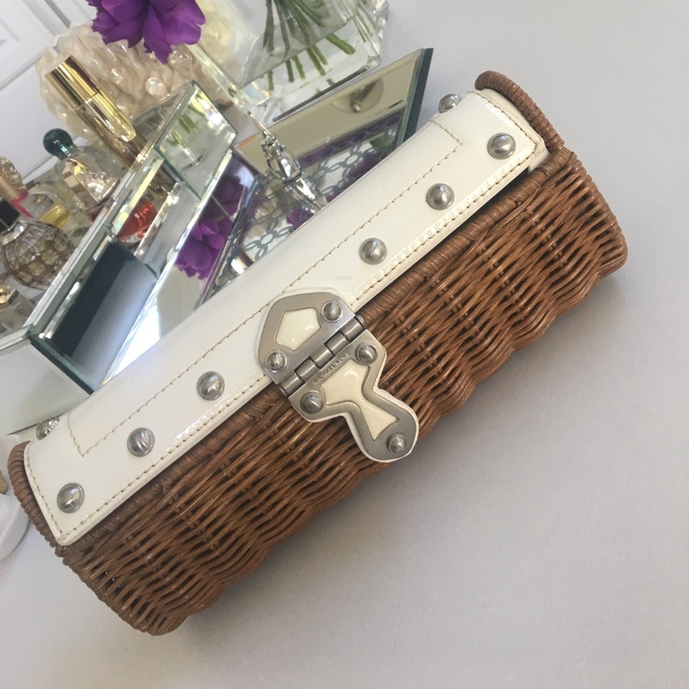 Authentic Michael Kors white basket clutch.