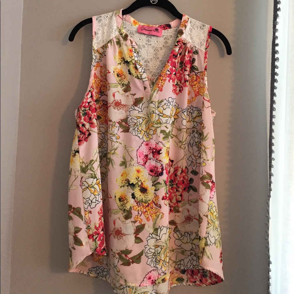 Pink floral sleeveless blouse