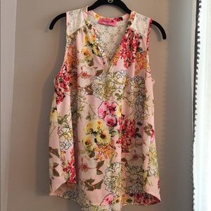 Pink floral sleeveless blouse