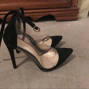 Black and clear pumps