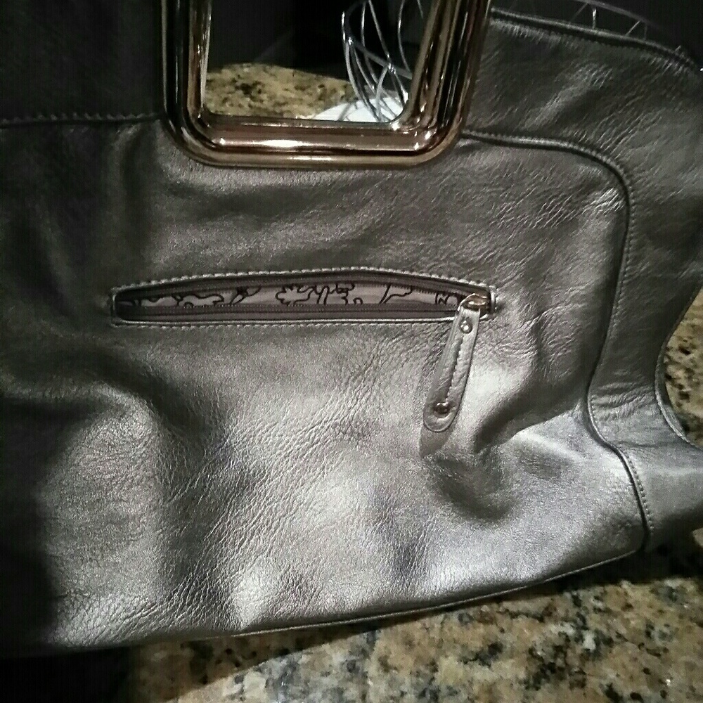 Metallic Silver with brown transparent handle