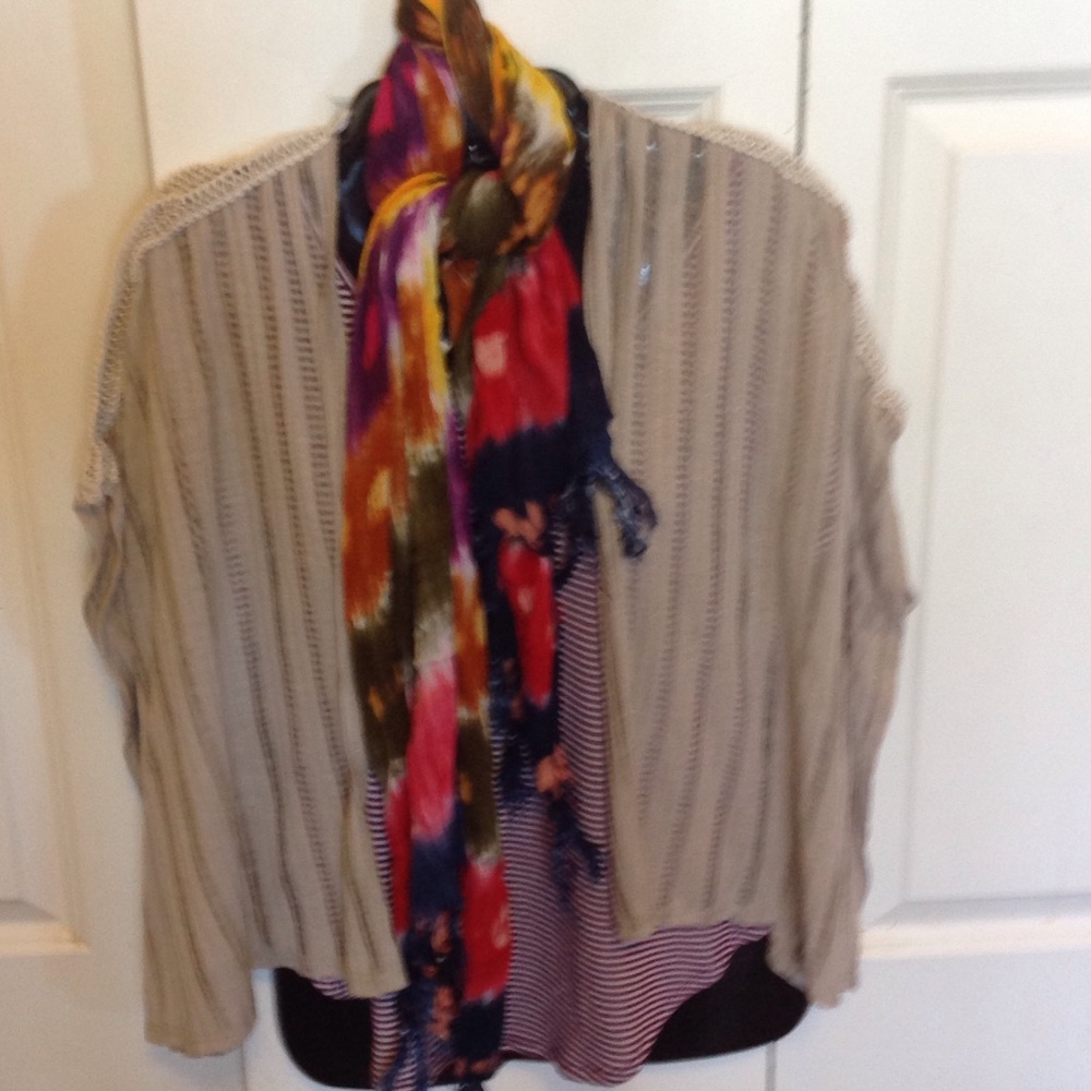 Sleeveless decorative tan jacket