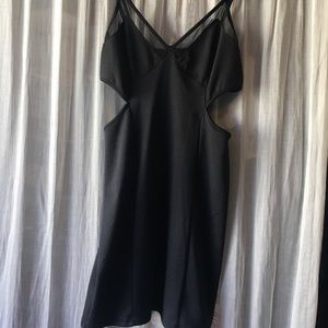Strapped black bodycon mini dress with cutouts!