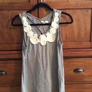 Super cute tank top with back cut out