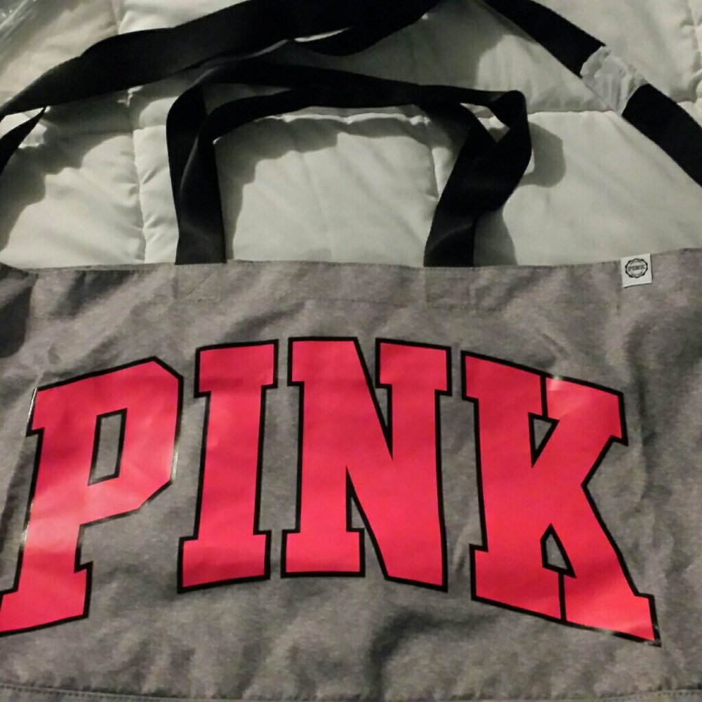 EXTRA LARGE VICTORIA SECRET BAG WITH ZIPPER CLOSURE. 2 STRAPS LENGTH. VERY NICE