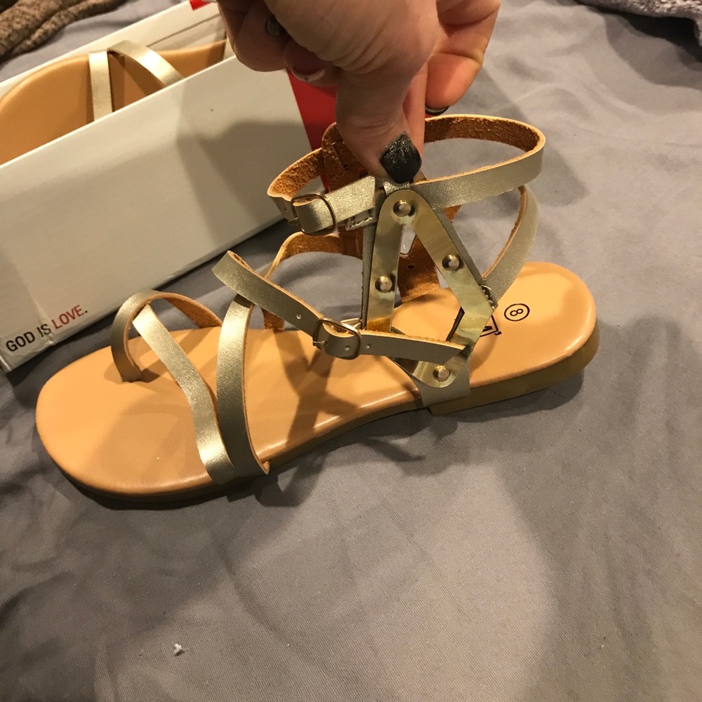 NIB gold gladiator sandals