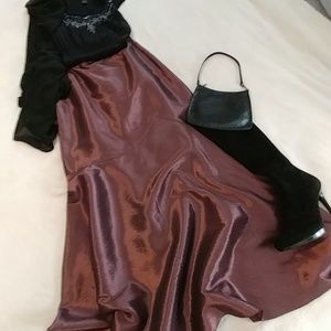 Shiny wine colored evening skirt. Mermaid cut.