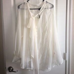 Cream blouse with lace detail